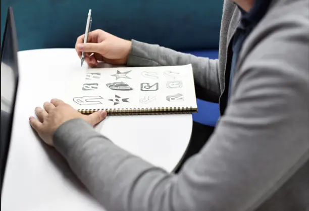 Professional logo designer working in modern office